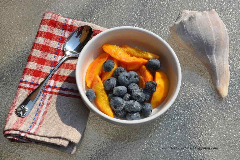 Beautiful breakfast bowl of Bennett Peaches and Bennett Blueberries. 